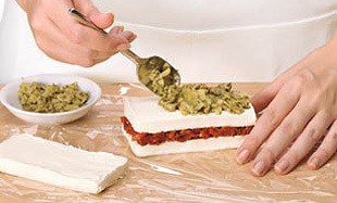 Layered-Sundried-Tomato-Artichoke-Spread-Step2 Layered-Sundried-Tomato-Artichoke-Spread-Step2