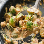 creamy sprouts with dates in a pan