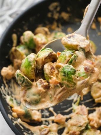 creamy sprouts with dates in a pan