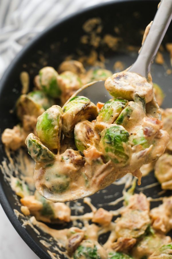 creamy sprouts with dates in a pan