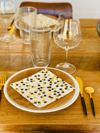 table setting with wood plate