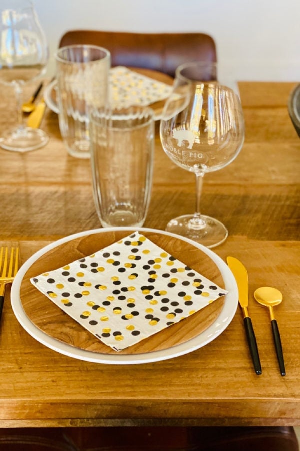 table setting with wood plate