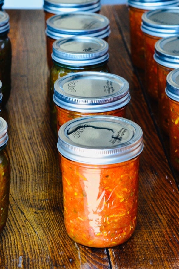 canning jars of Sweet Smokey Zucchini Salsa