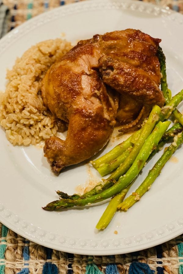 Baked Marinated Cornish Game Hen with rice and asparagus