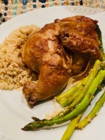 one Marinated Cornish Game Hen on dinner plate