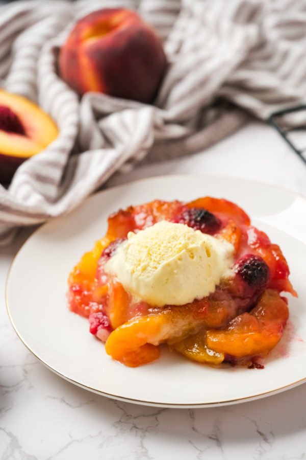 a serving of Peach Raspberry Cobbler