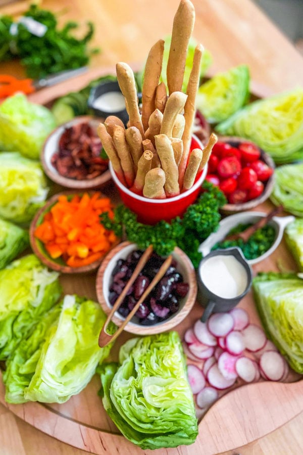 breadsticks on wedge salad board