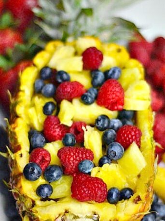 a pineapple boat recipe filled with fruit