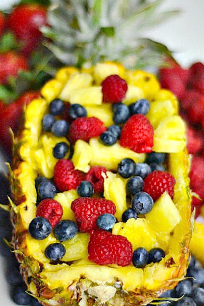 a pineapple boat recipe filled with fruit