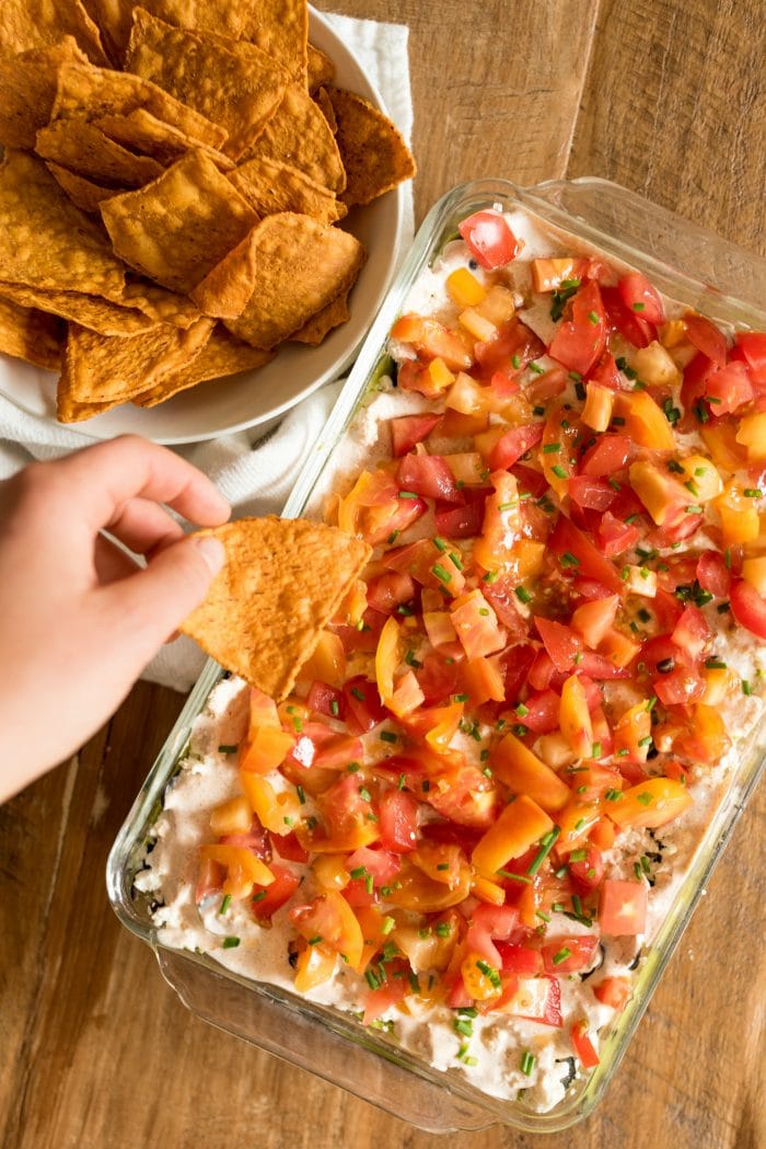 sweet potato chip and 9x13 pan of 7 layer bean dip