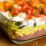 layers of 7 layer dip in glass pan