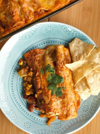 Vegetarian Enchiladas on a blue plate