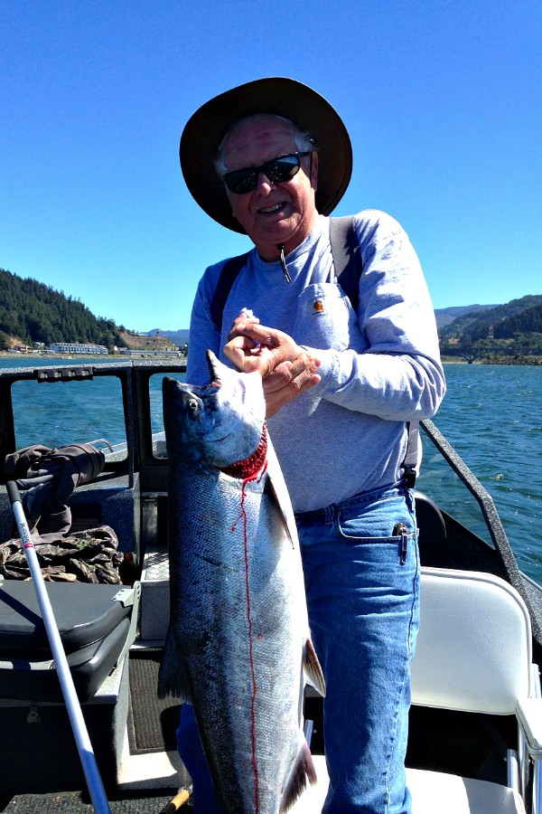 Grilled Lemon Dill Salmon Dad catching salmon