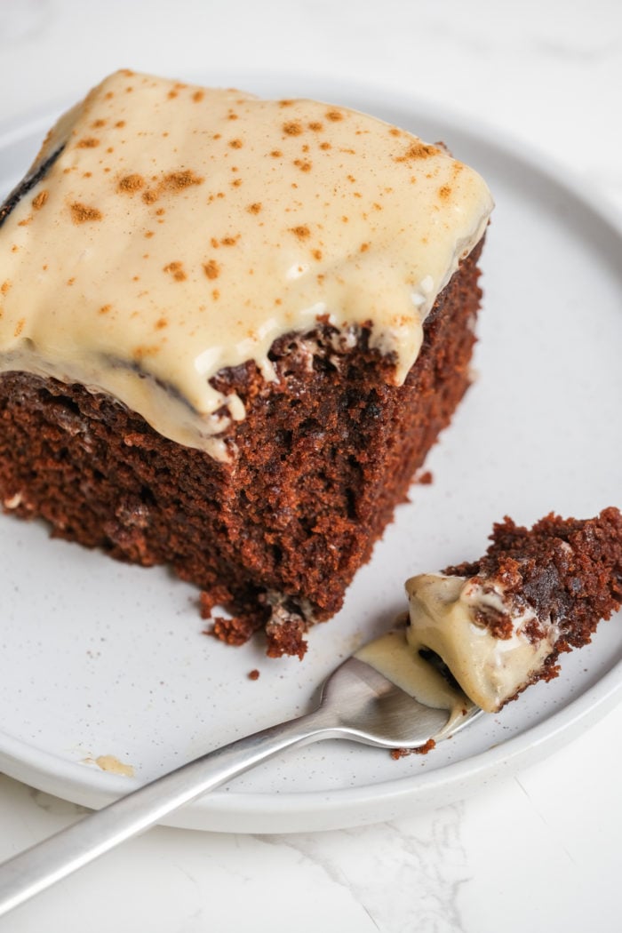 a bite of Gingerbread Cake with Cinnamon Molasses Frosting