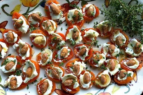 plate of dried apricot bites with goat cheese