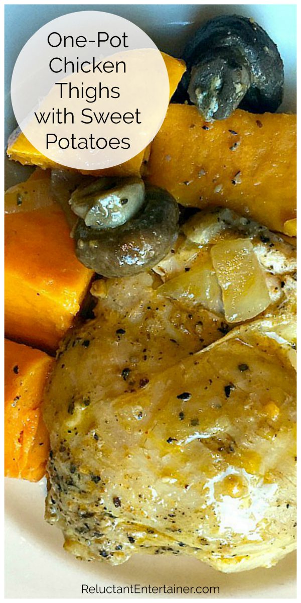 cooked chicken thigh with small mushrooms and chunks of sweet potato