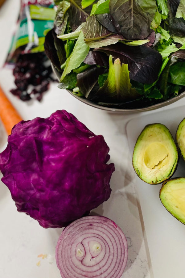 a head of red cabbage for a green salad