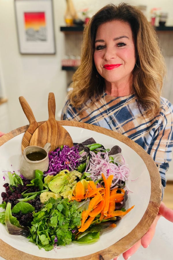 Woman holding a Dinner Party Salad