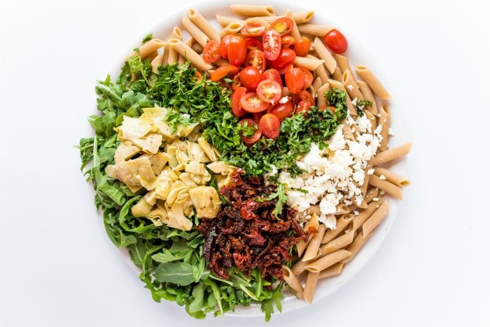 arugula salad ingredients on a plate