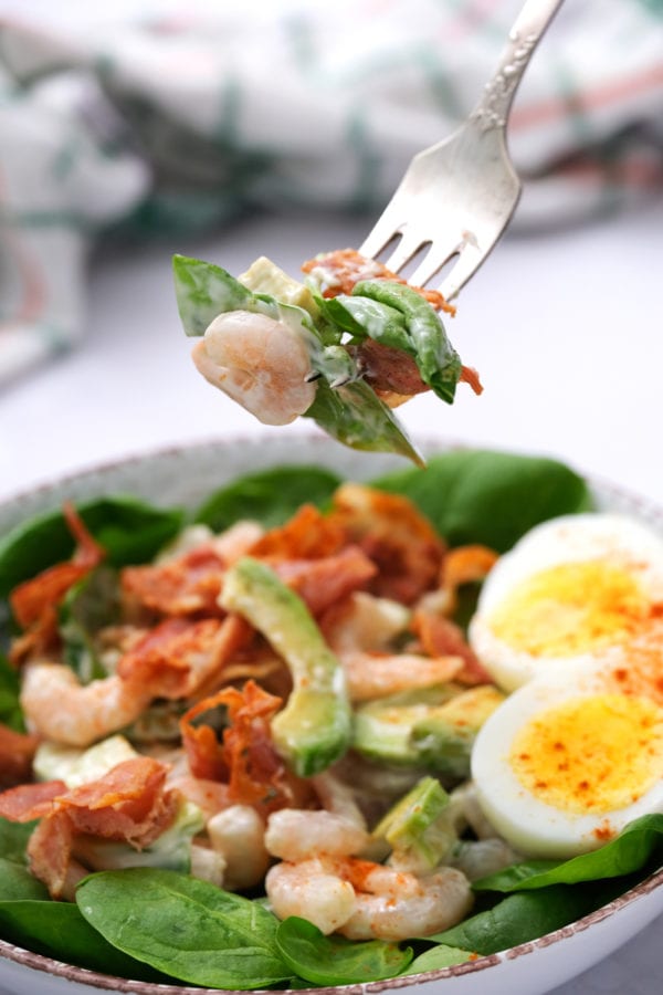 bite of Green Salad with Shrimp and Avocado