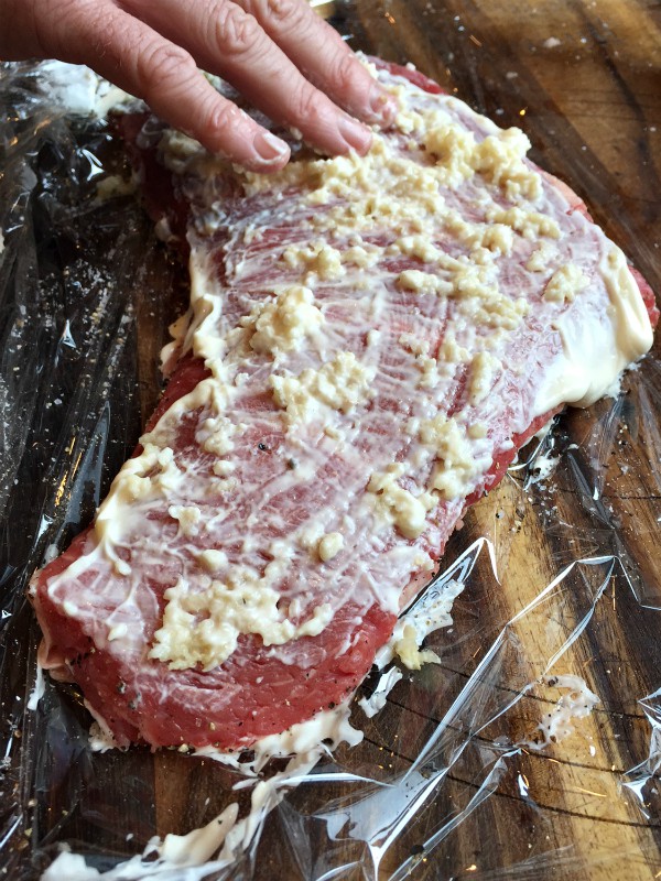 Slab of Tri Tip with mayonnaise and garlic