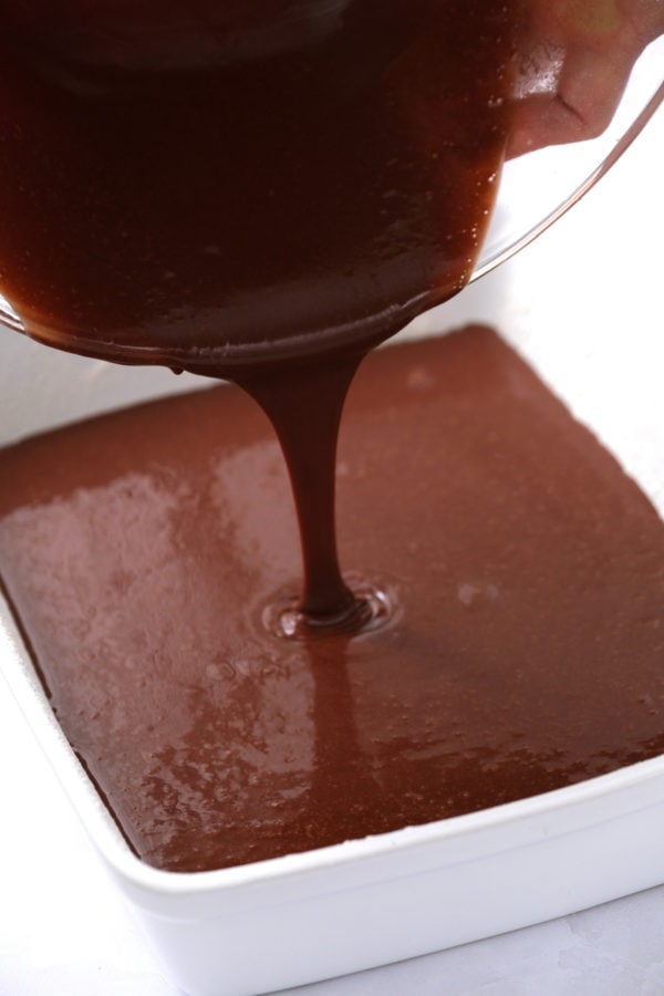 pouring chocolate cake batter