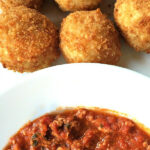 Arancini al Forno with ragu sauce