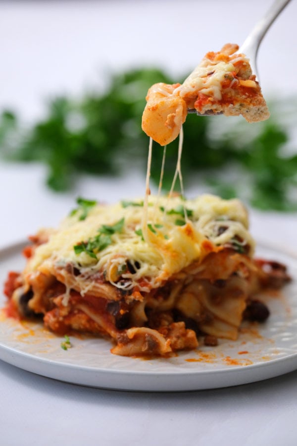 cheesy bite of Skillet Mexican Lasagna