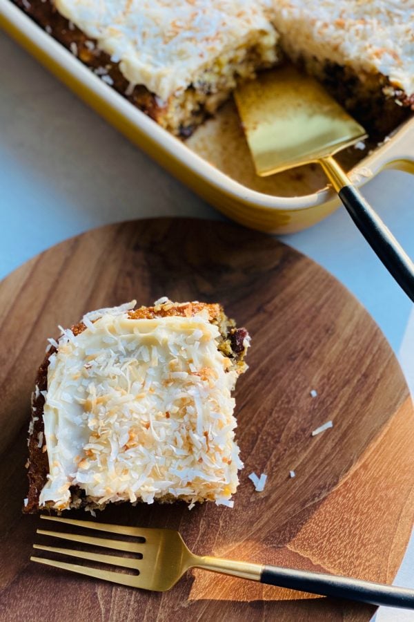 square piece of pineapple cake with cream cheese frosting