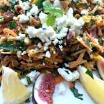 Delicious carrots, figs, goat cheese, herbs - a beautiful presentation for this Carrot Honey Pistachio Salad