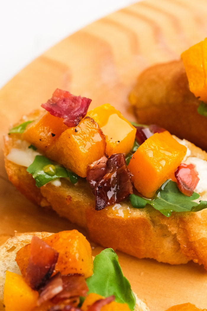 butternut, bacon, arugula crostinis