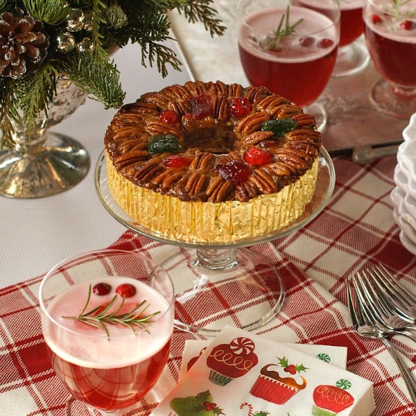 Collin Street Bakery Deluxe® Fruitcake is festive, and delicious served with a Cranberry Kir Royale holiday drink