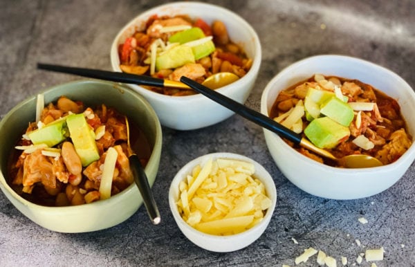 bowl of white bean chicken chili with cheese