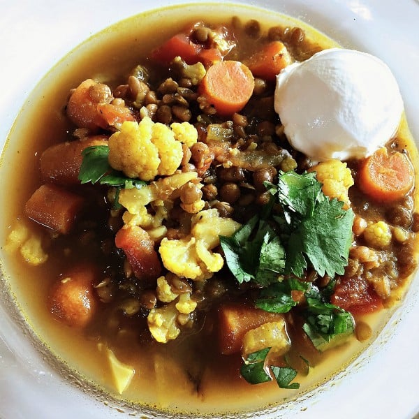 round bowll of Moroccan Lentil Cauliflower Soup