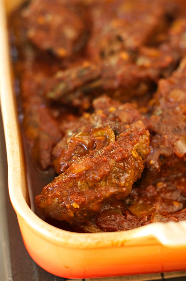 Barbecue Spareribs are slow cooked, and delightful tossed on the barbecue for camping or easy grilling!