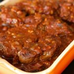 Barbecue Spareribs are slow cooked, and delightful tossed on the barbecue for camping or easy grilling!