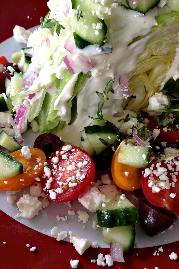 Greek Wedge Salad is an easy, fun, luncheon dish to serve with fresh ingredients!
