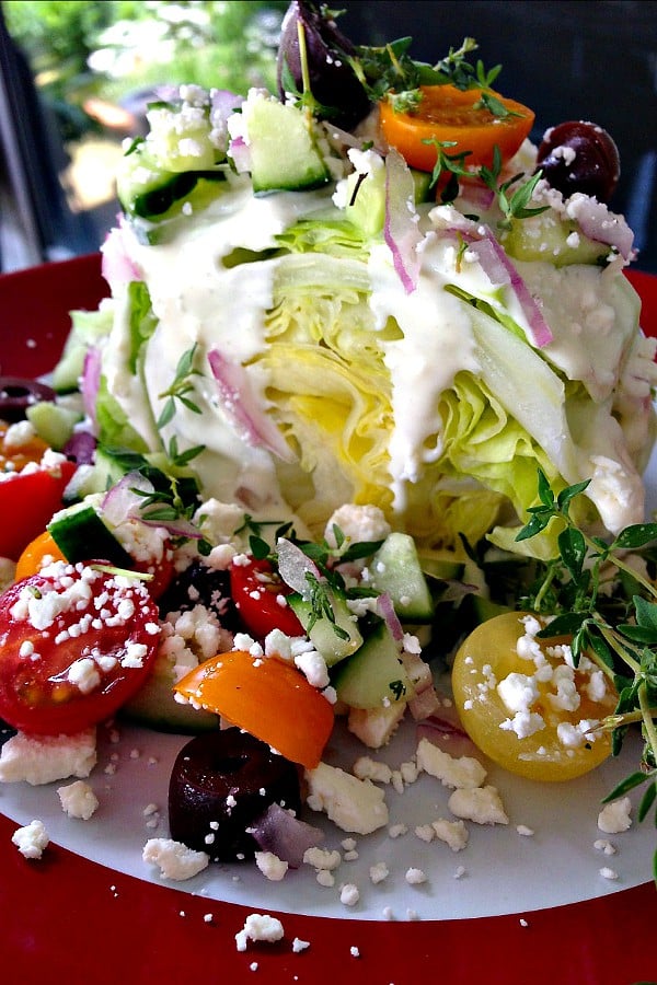 Greek Wedge Salad is an easy, fun, luncheon dish to serve with fresh ingredients!