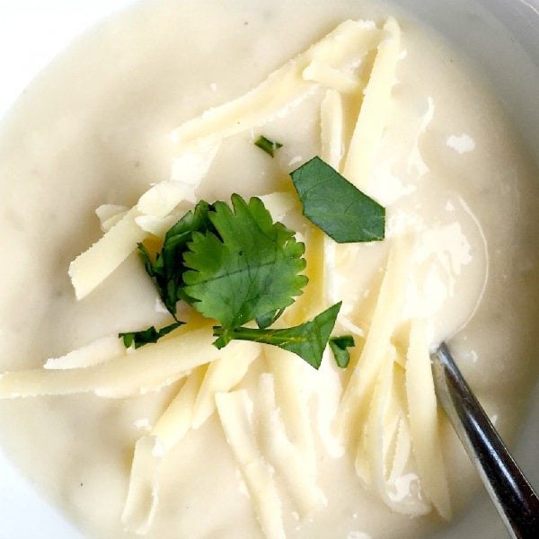 Cauliflower White Cheddar Cheese Soup with grated cheese on top