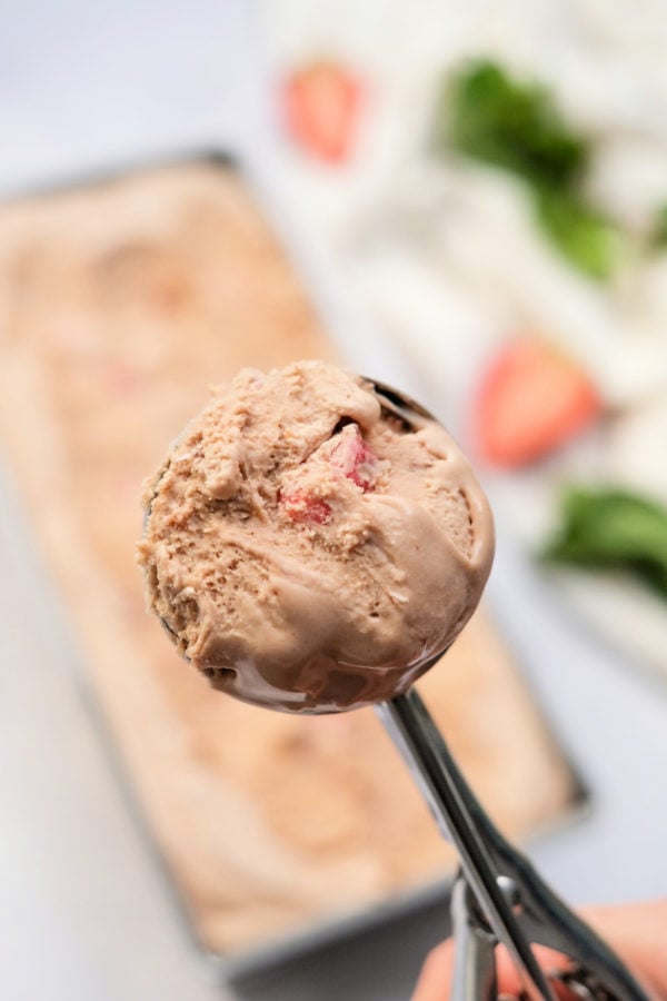 a scoop of frozen strawberry nutella ice cream