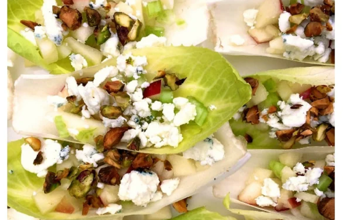 apples on endive with blue cheese and pistachio