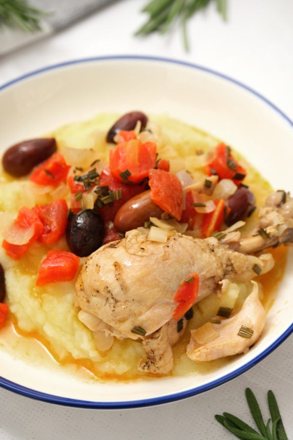 Greek Style Chicken Drumstick on potatoes