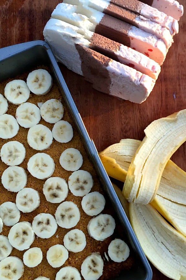 Banana Split Dessert ingredients, with slices of ice cream and sliced bananas