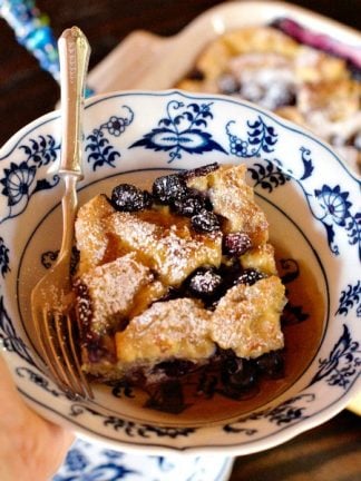 Blueberry Salted Caramel French Toast Casserole for breakfast, brunch, or even dessert, served warm with vanilla ice cream!