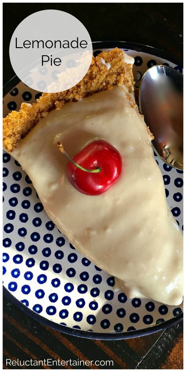 a slice of lemonade pie with graham cracker crust