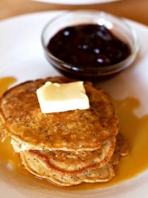 Lemon Poppyseed Pancakes with Berry Compote, the perfect breakfast for out-of-town company, made with frozen berries!