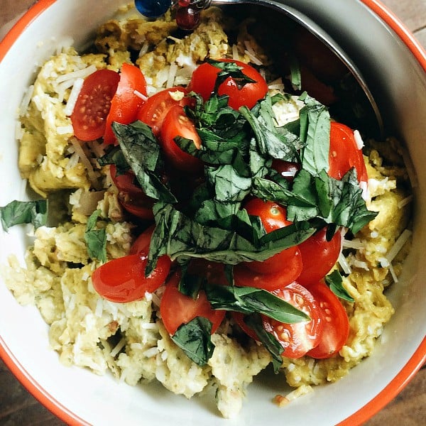 Creamy Pesto Goat Cheese Eggs are a delicious dish to serve with fresh tomatoes and basil, perfect for a weekend breakfast or brunch!
