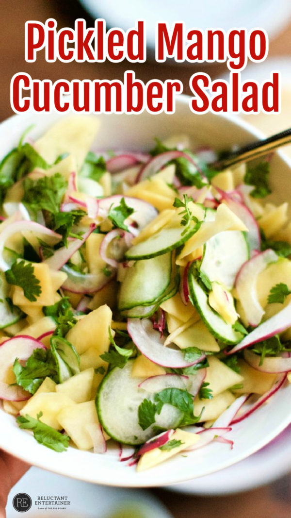 a salad bowl of Pickled Mango Cucumber Salad