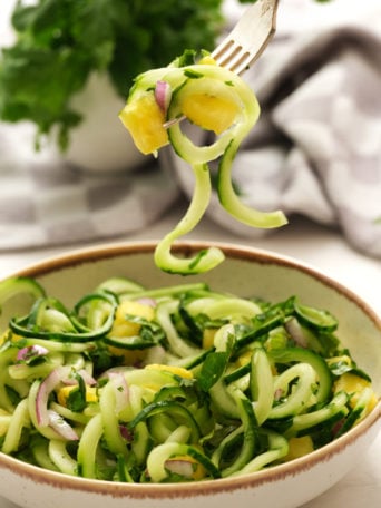 a bite of cucumber pineapple salad