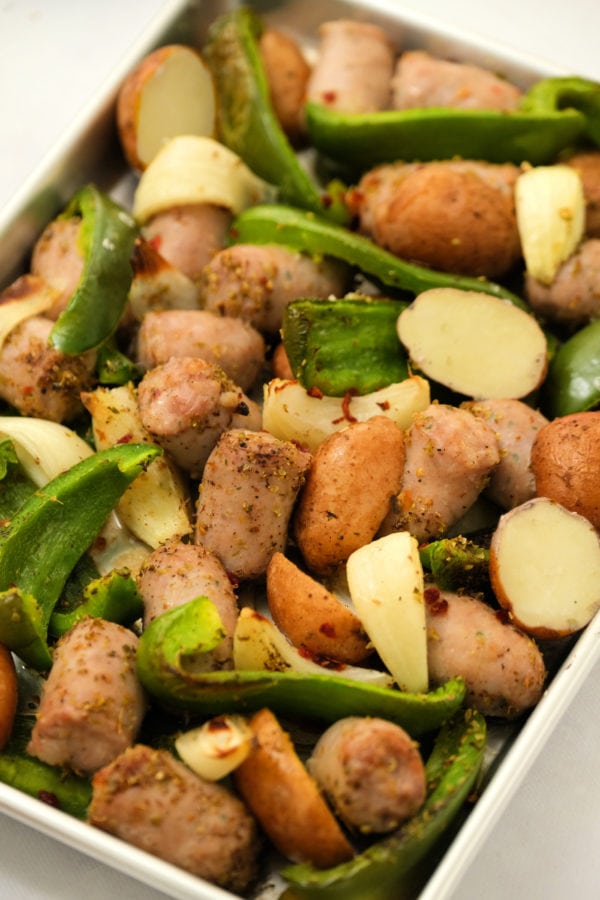 easy Roasted Bratwurst Potatoes and Peppers on baking sheet